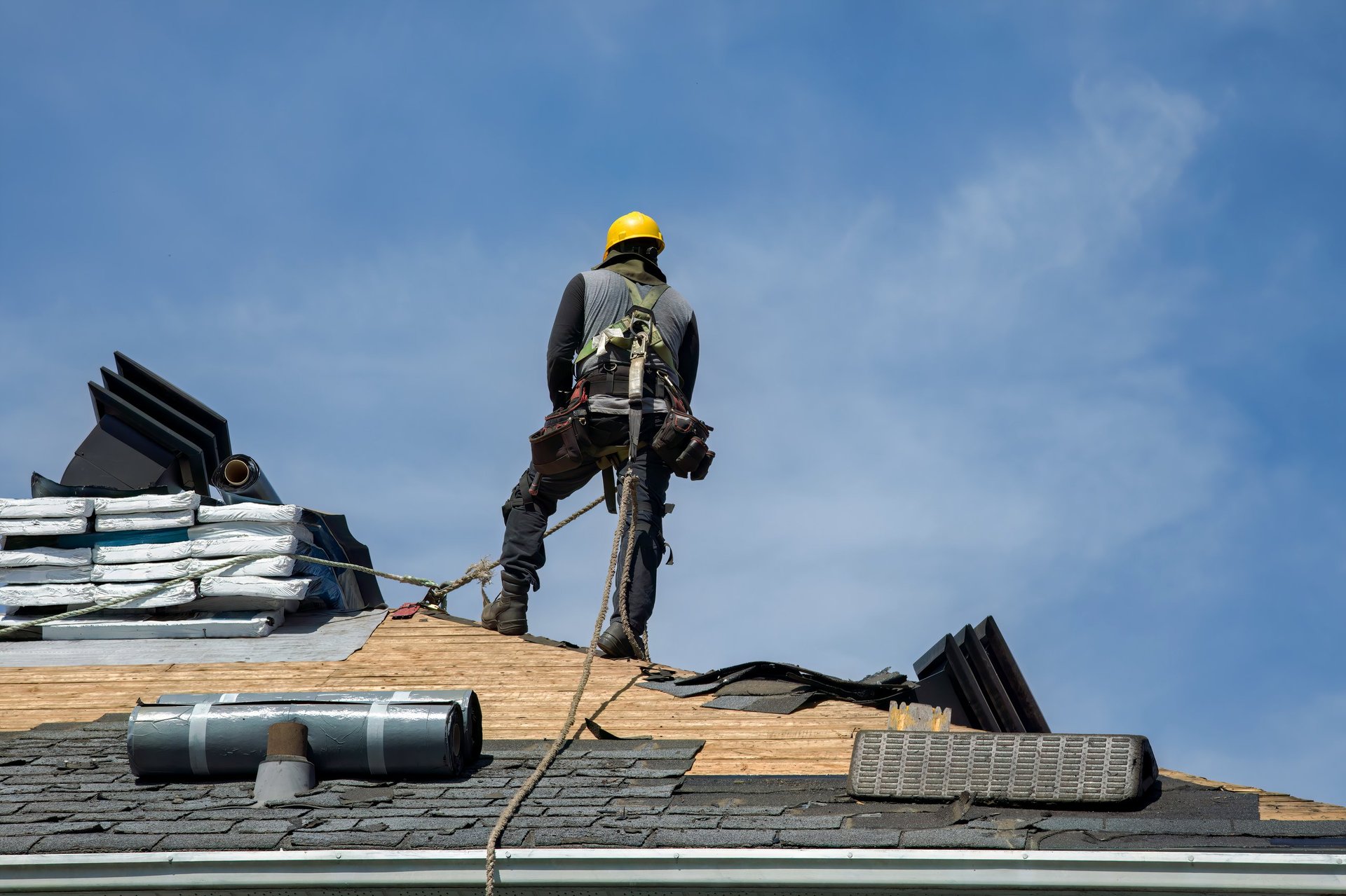 Construction worker with helmet and tools